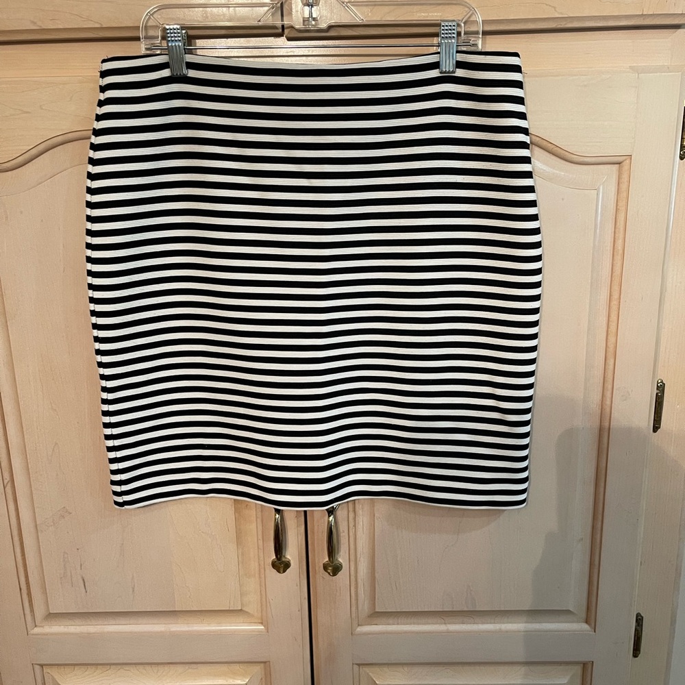 A LOFT size 14P black and white striped skirt. It is perfect for all year!